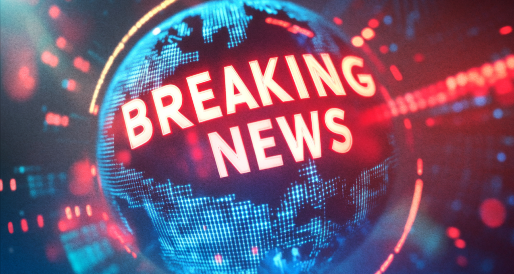 Digital globe displaying the words 'Breaking News' in bright red, symbolizing urgent updates in the news and crypto markets. - The Coinomist