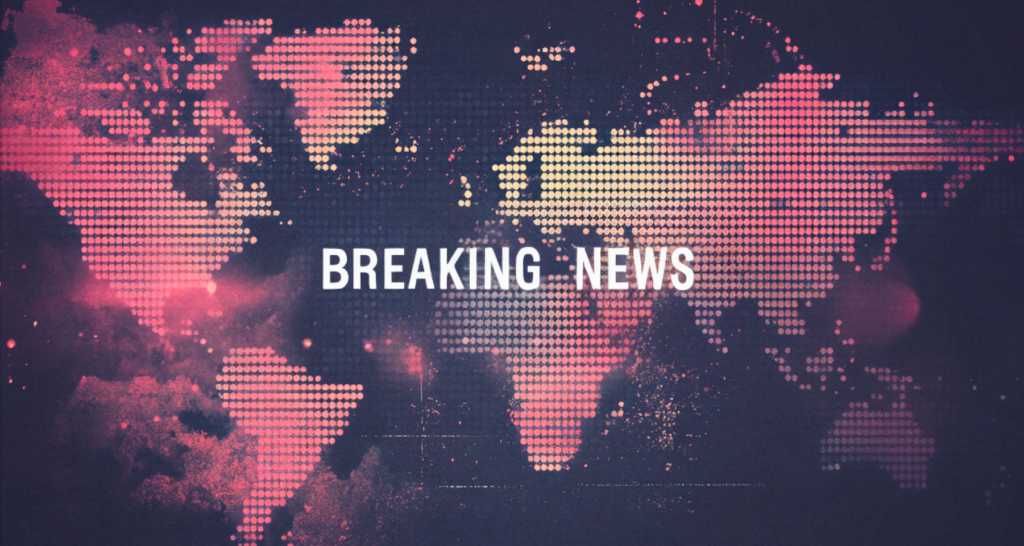 A world map with the words 'Breaking News' prominently displayed, symbolizing global cryptocurrency updates - The Coinomist