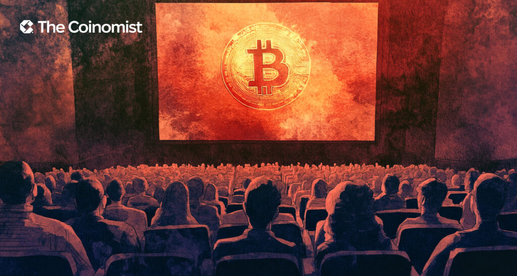 cinema, viewers are looking at the screen. On the screen is bitcoin - The Coinomist