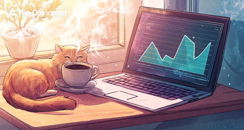 a laptop on the table, a cup of coffee next to it and a cat sleeping near the laptop - The Coinomist
