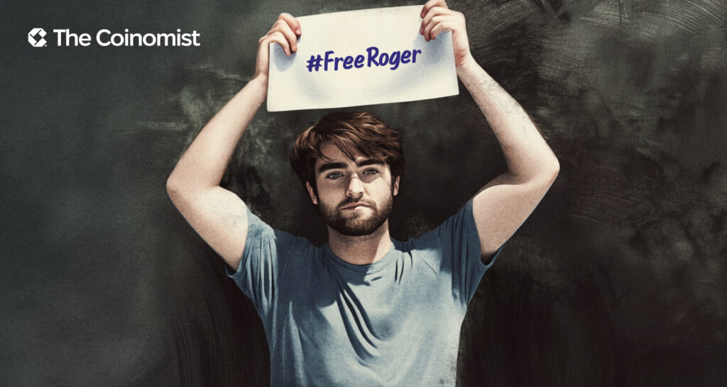 Ross Ulbricht holding a banner with Roger Ver's face and #FreeRoger on it - The Coinomist