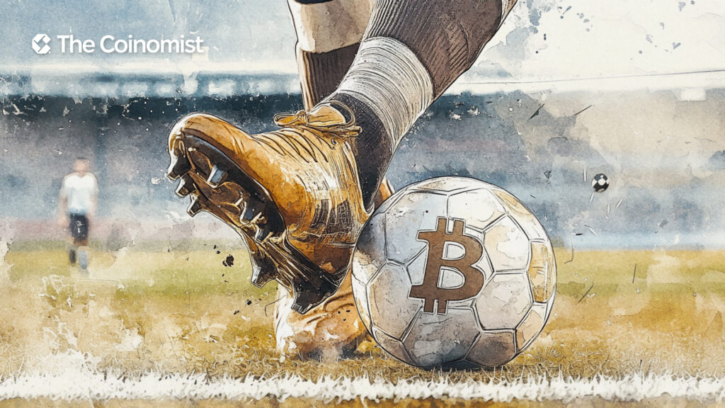 a foot in a football boot kicking a ball that has the Bitcoin symbol - The Coinomist