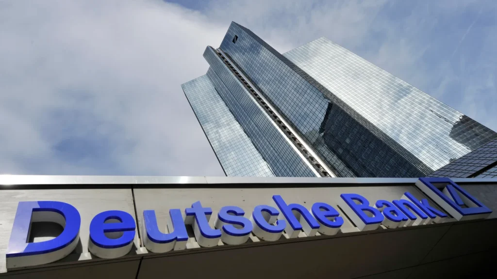 Deutsche Bank headquarters building with logo in Frankfurt — The Coinomist