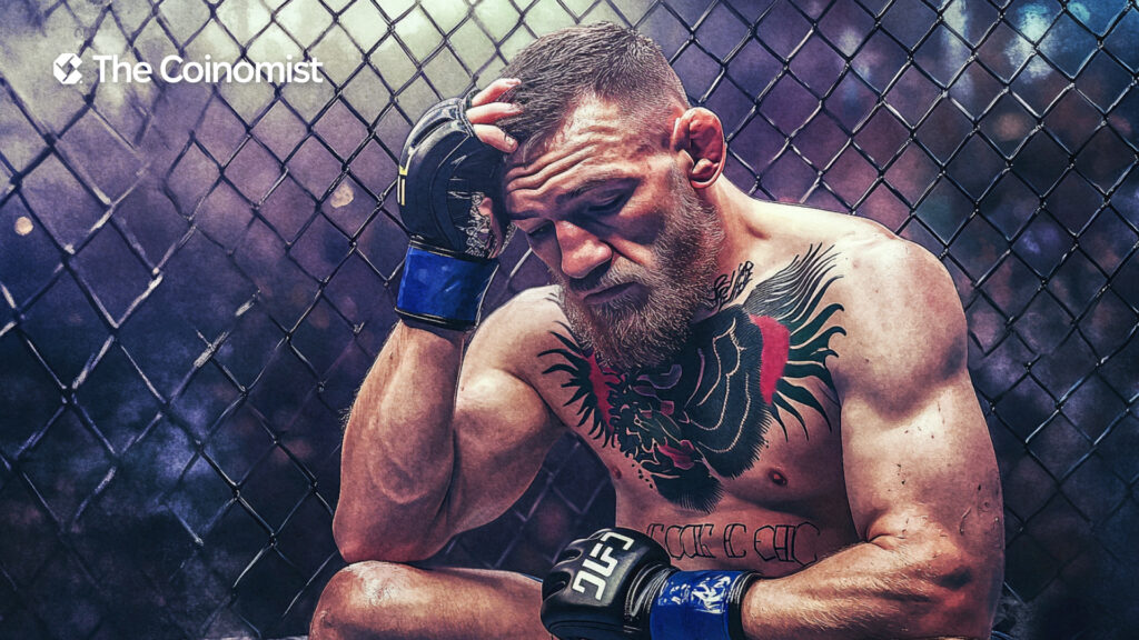 Conor along with clear symbols of defeat - The Coinomist