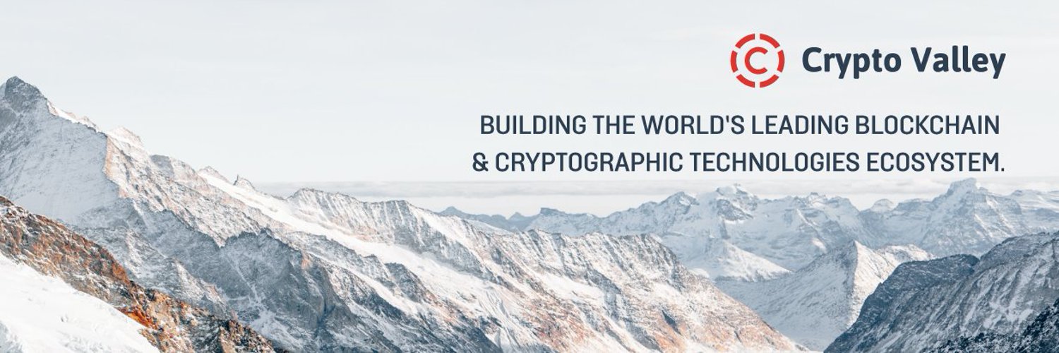 Banner image showing the Crypto Valley Association logo and tagline over snow-capped Swiss Alps promoting blockchain and cryptographic technology ecosystem.