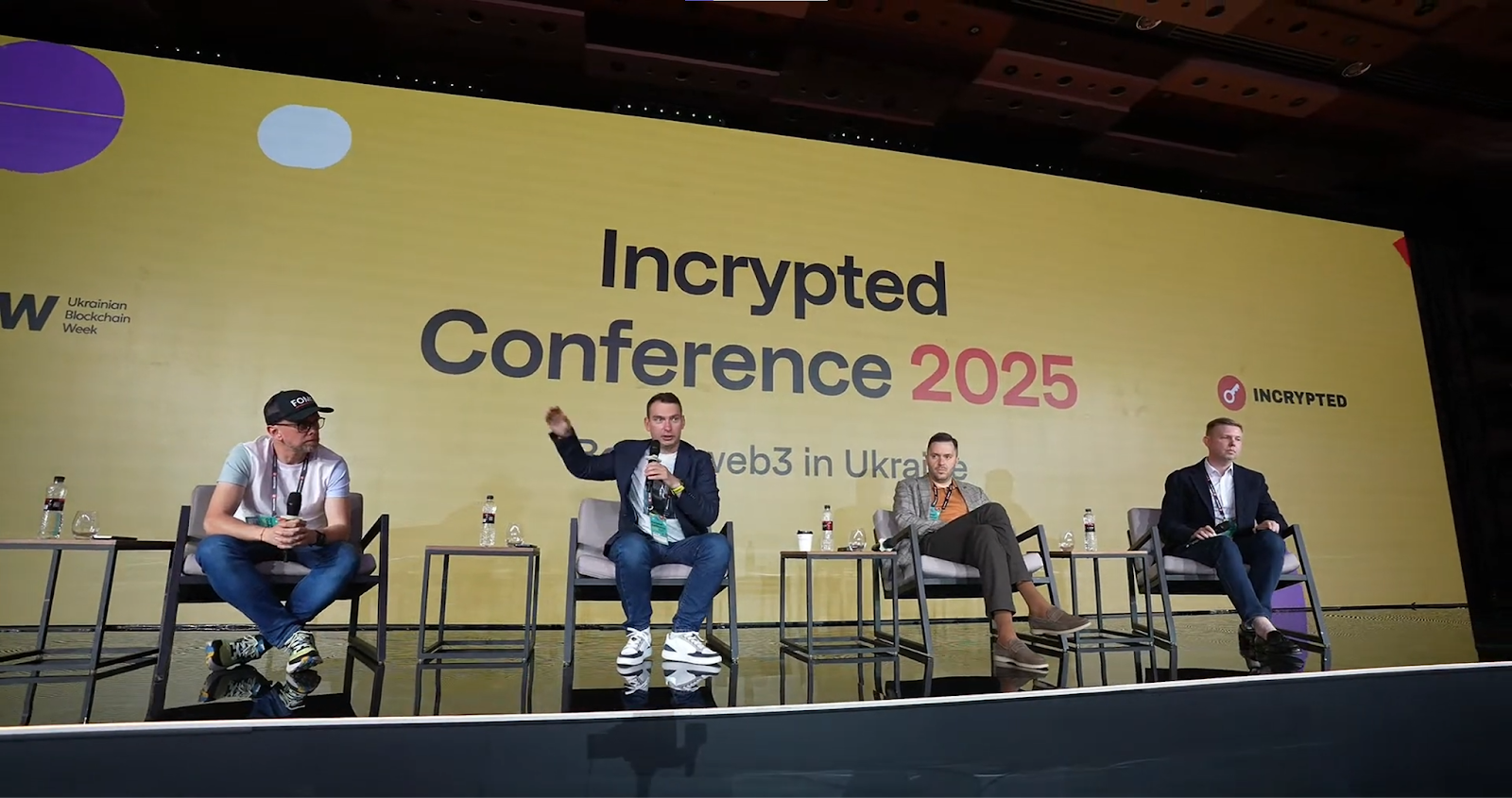 Four speakers at the panel on crypto regulation in Ukraine — The Coinomist.